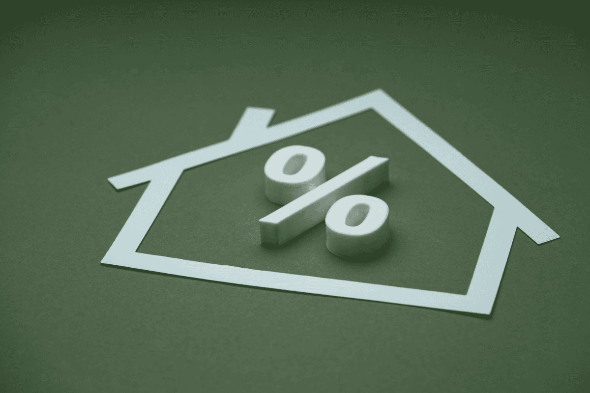House with a percentage sign representing equity release in the West Midlands